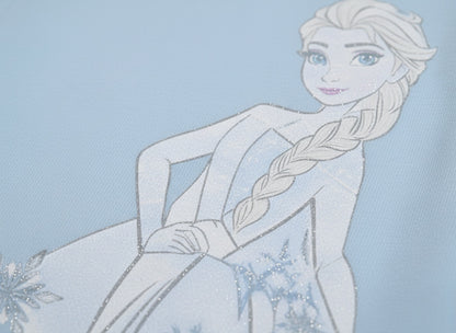 Frozen in a white dress with braided hair against a light blue background