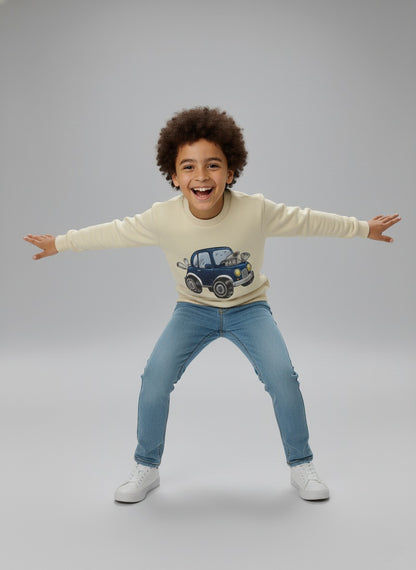 Child wearing a beige cotton sweatshirt with a car design 
