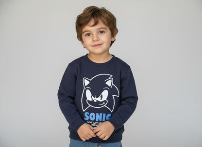Child wearing a navy blue sweatshirt with Sonic the Hedgehog design on a gray background