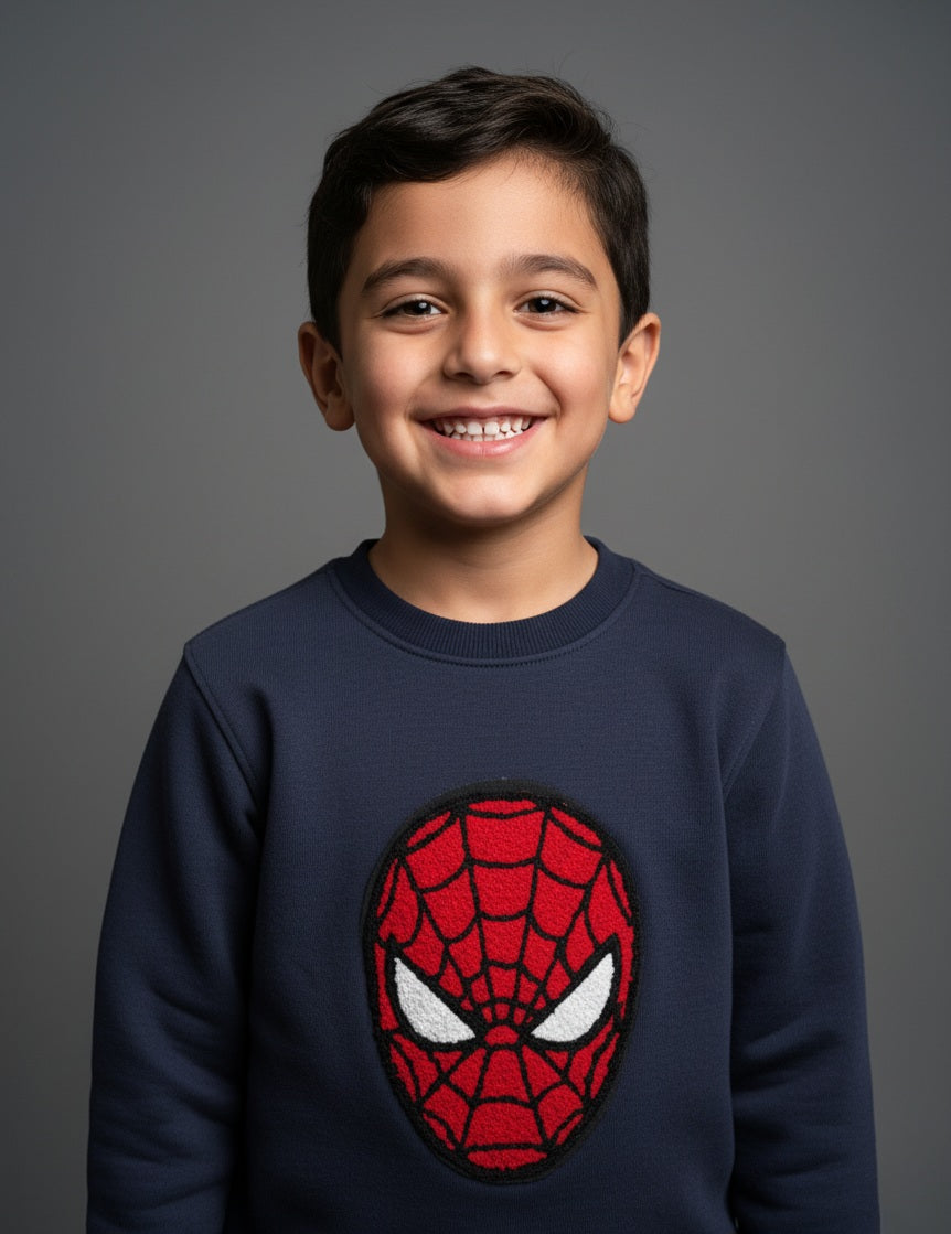 Child wearing a navy blue cotton sweatshirt with a Spider-Man logo on a gray background- Zoonikid