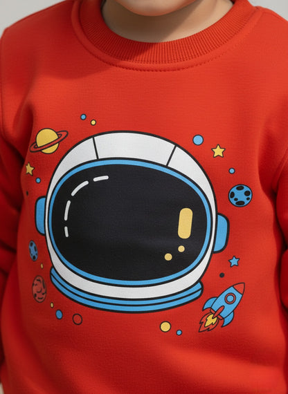 Orange sweatshirt with an astronaut helmet design on a plain background