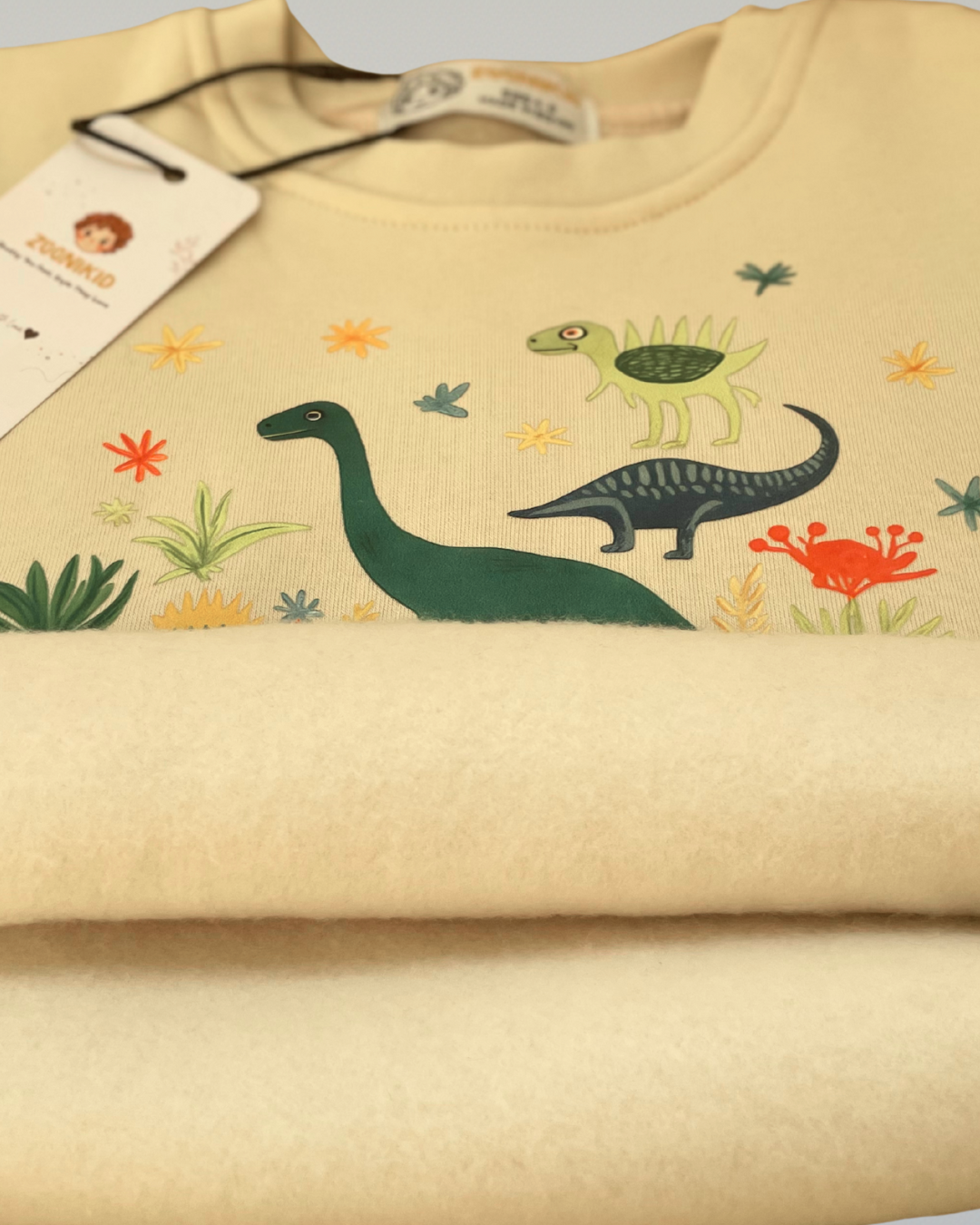 سويت شيرت عالم الديناصورات  للجنسين - بيج